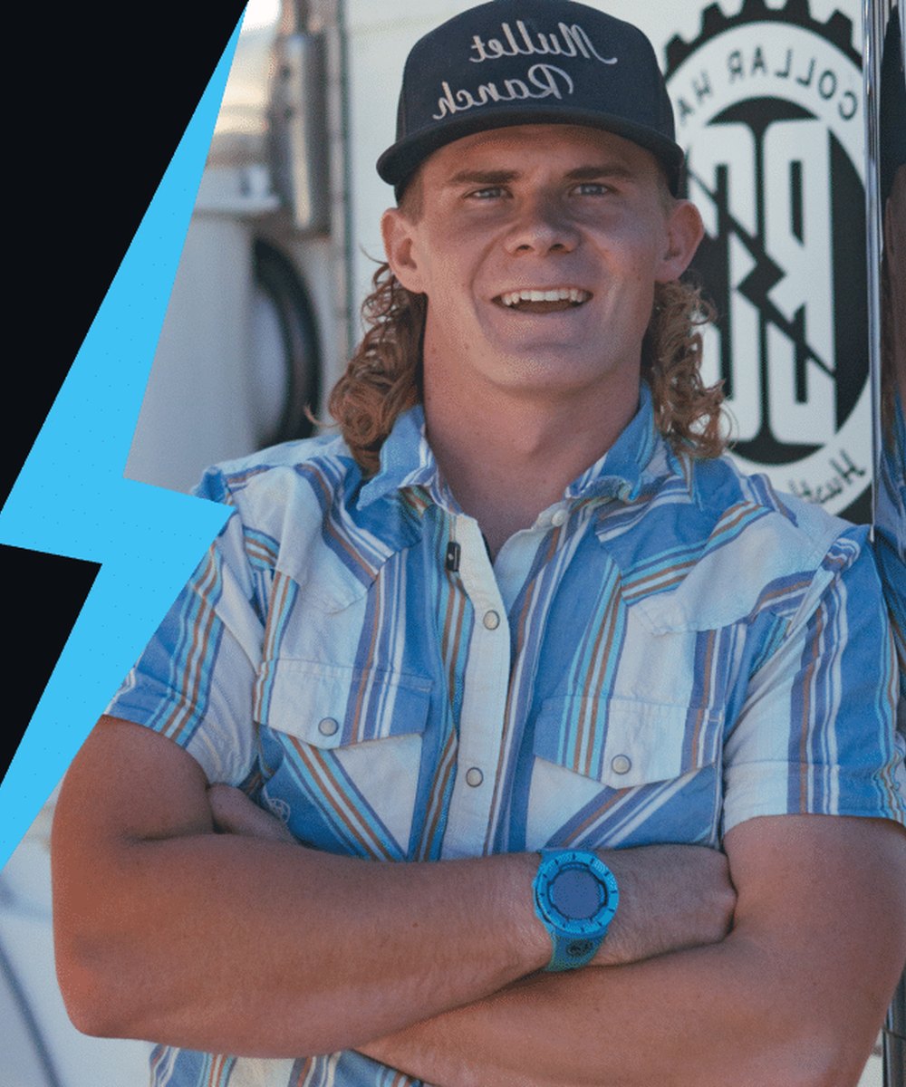 Cody Chew, owner of Blue Collar Haulers, in front of the truck